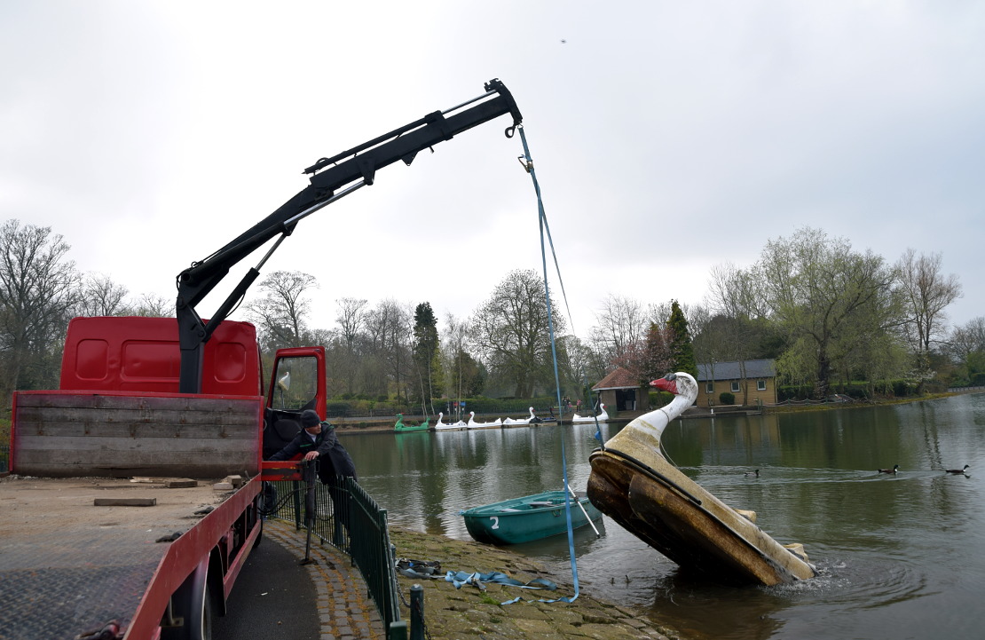 Extracting a sunken pedal boat at Saltwell Park in Gateshead